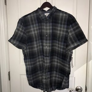 Short sleeve button up. Brand new with tag